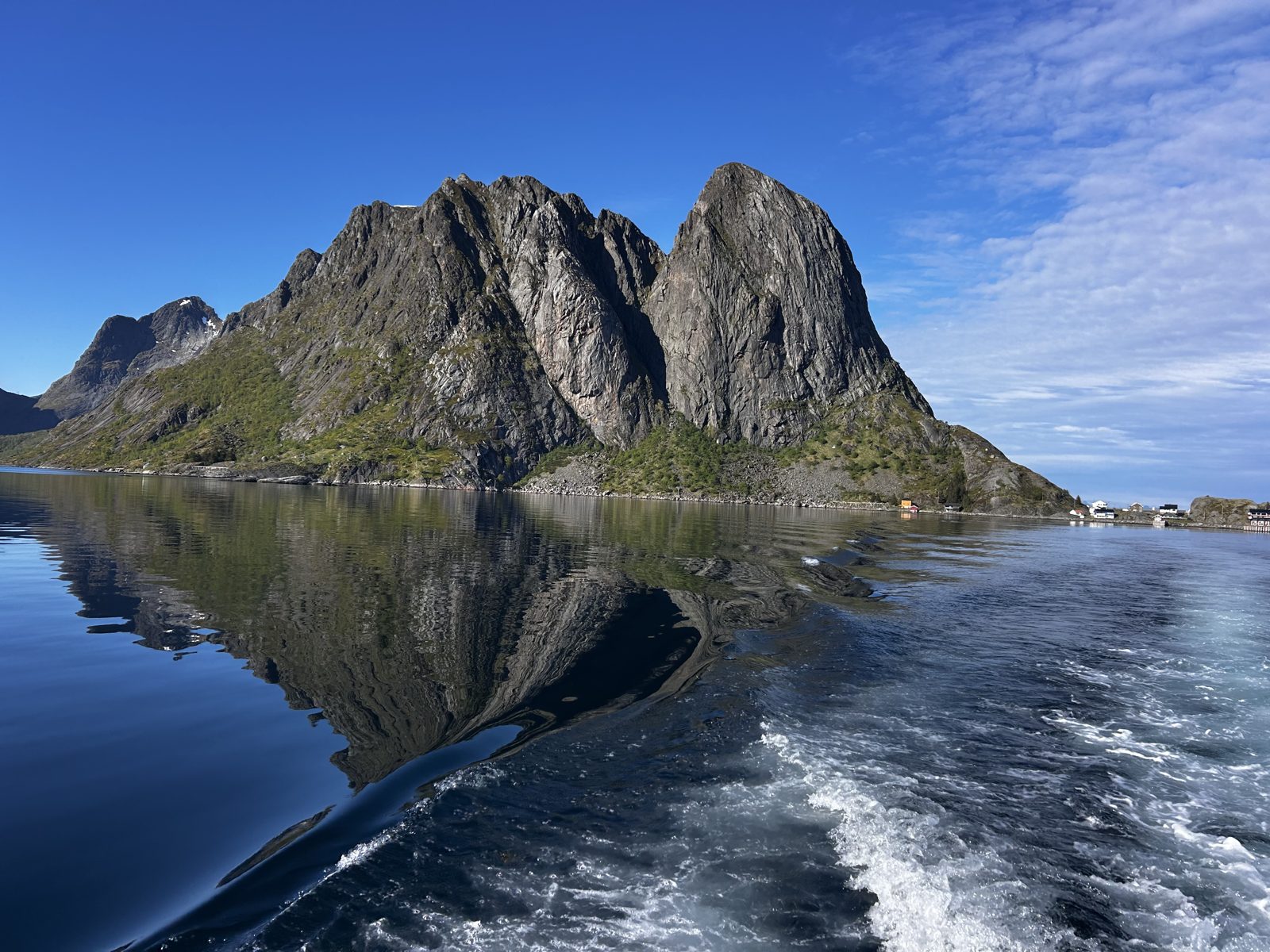 The peaks at Reine mirrored in still water
