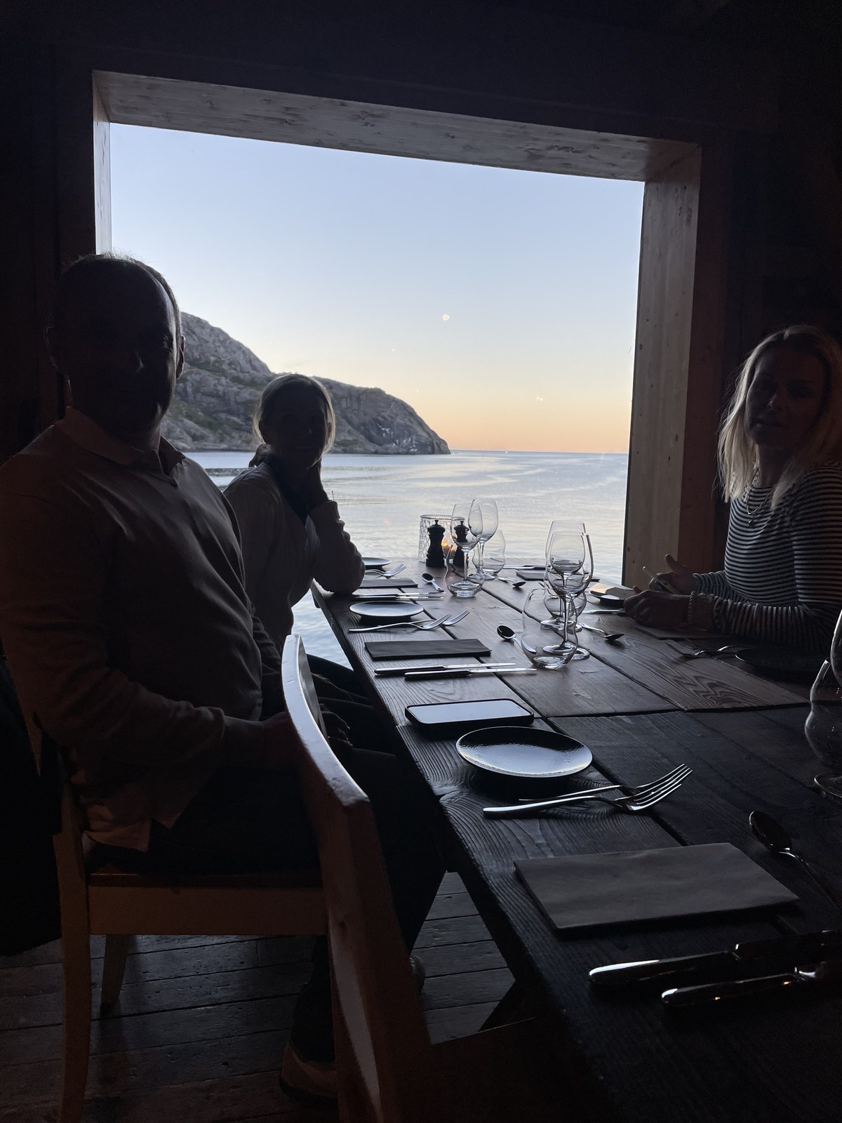 A window table over the sea at Nusfjord at sunset.