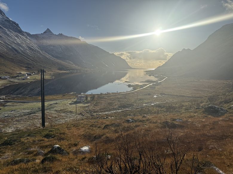 Low sun down Skjelfjorden &mdash; from the edge path