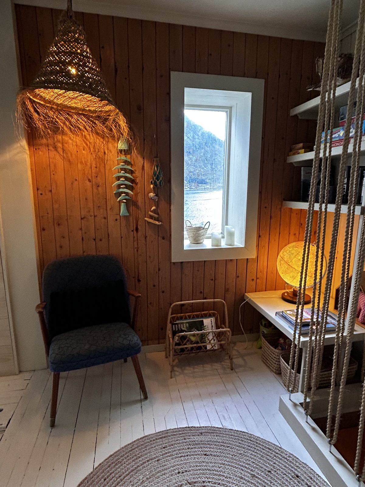 The reading corner, with the window to the fjord.