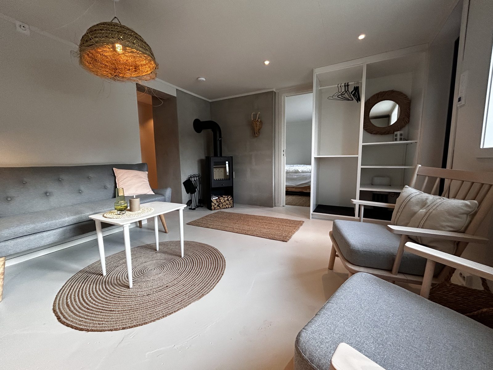 The living room on the lower floor. Photo 1 of 6.