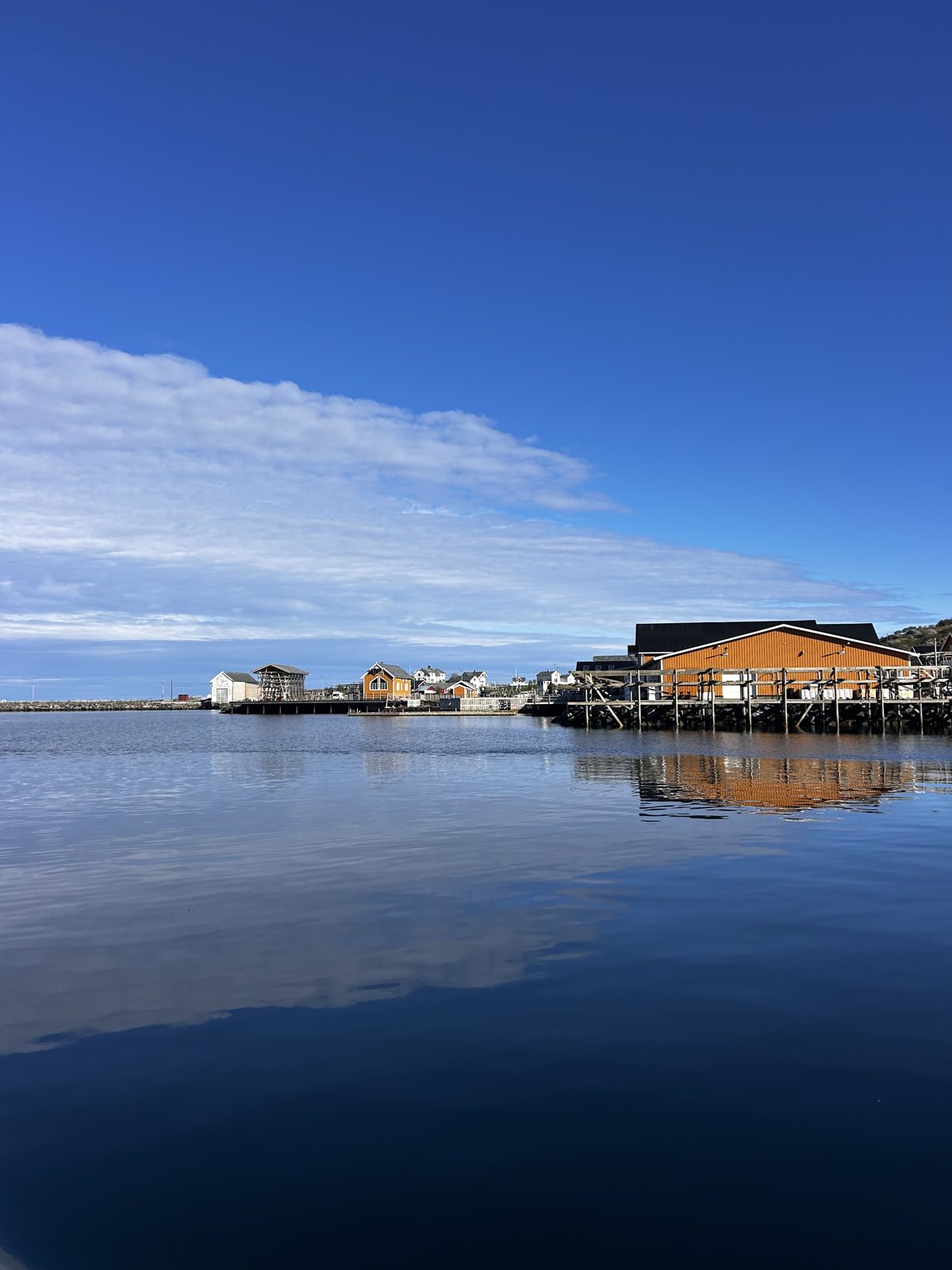 A sea house on the waterline, seen from the boat