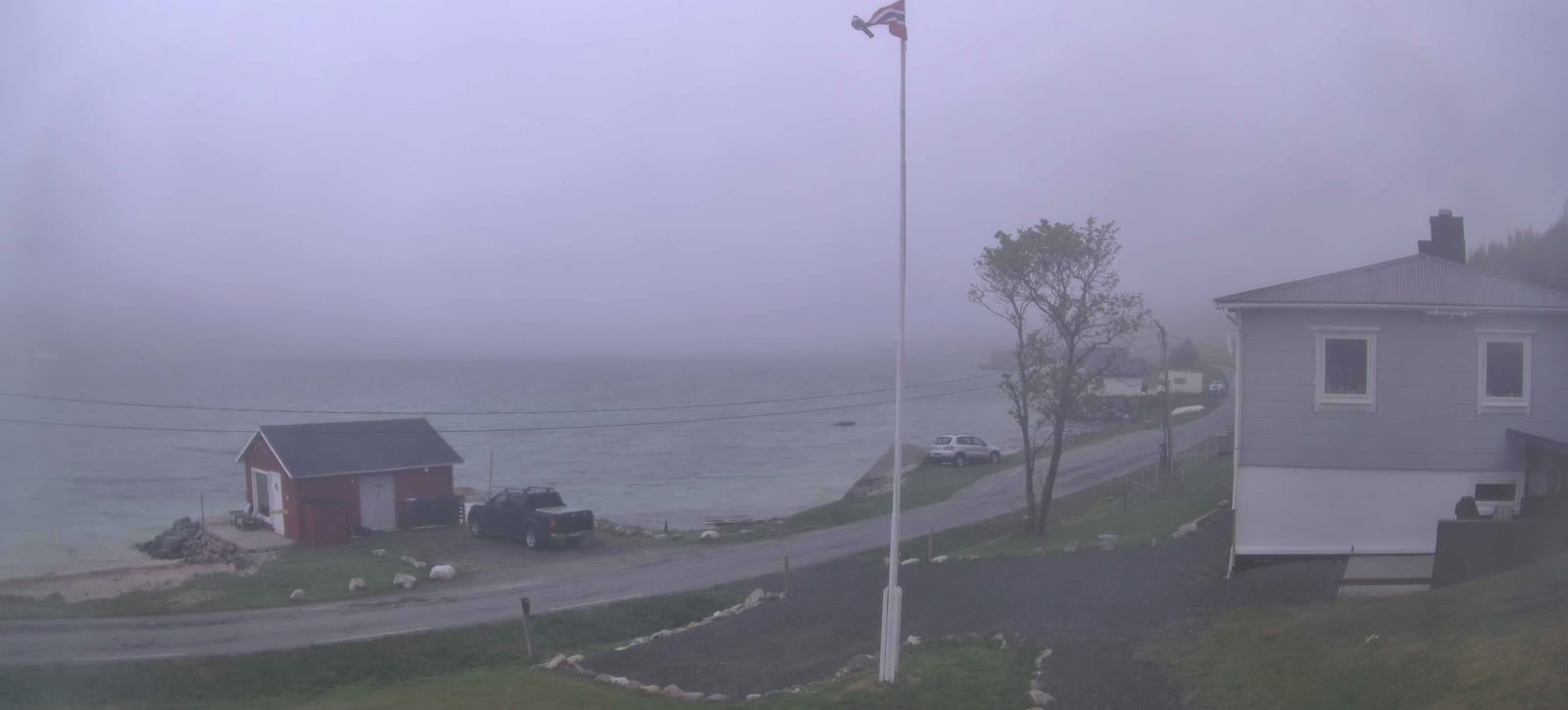 The same view in thick fog, the red boathouse barely visible, 21 May.