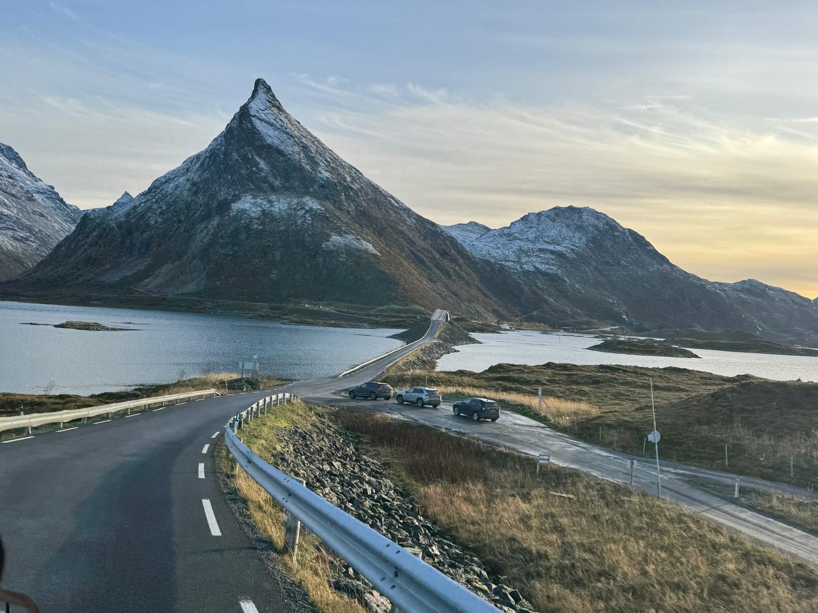 The road over the Fredvang bridges, with Volandstind behind.
