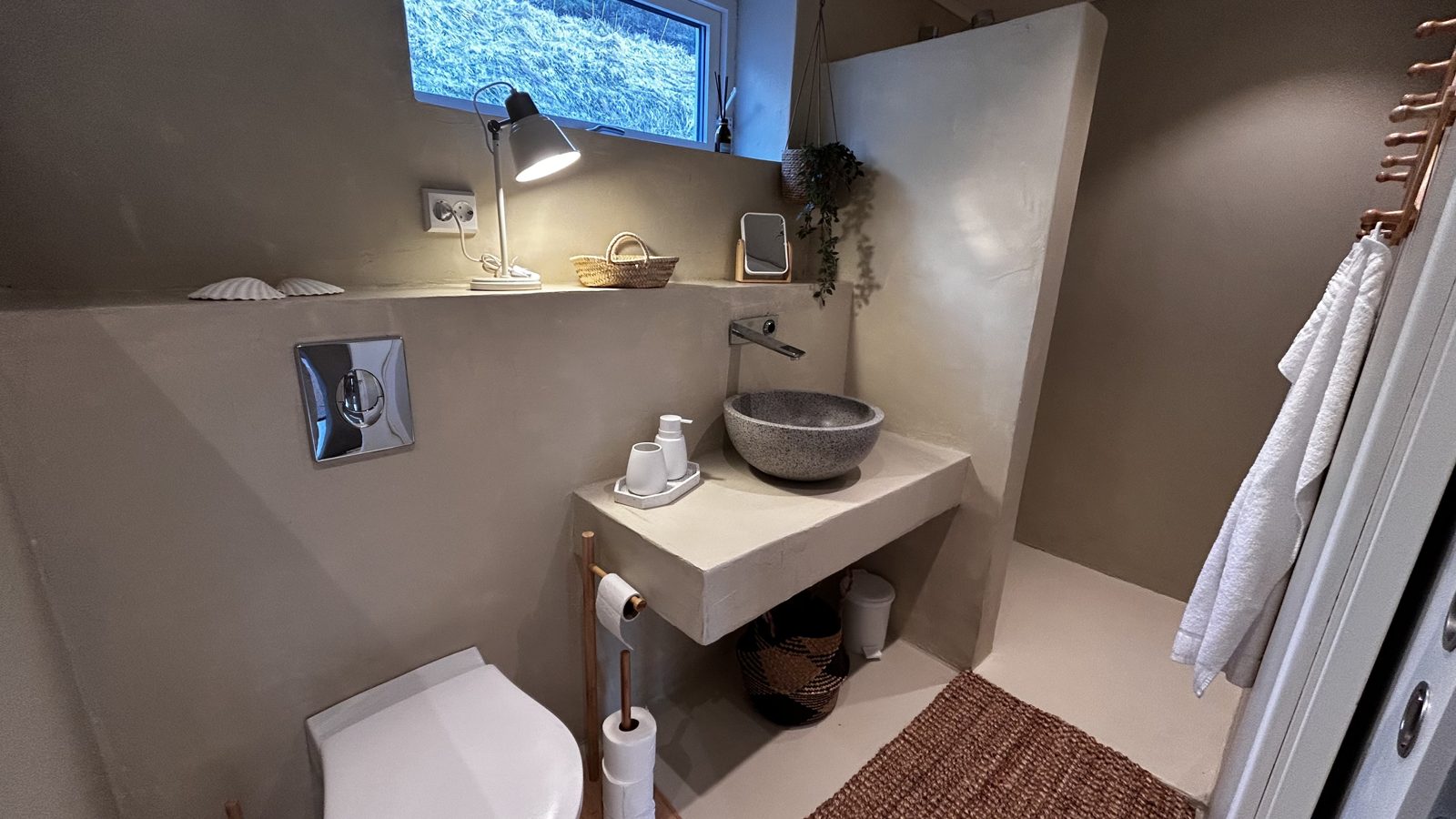 Bathroom on the lower floor. Photo 1 of 8.