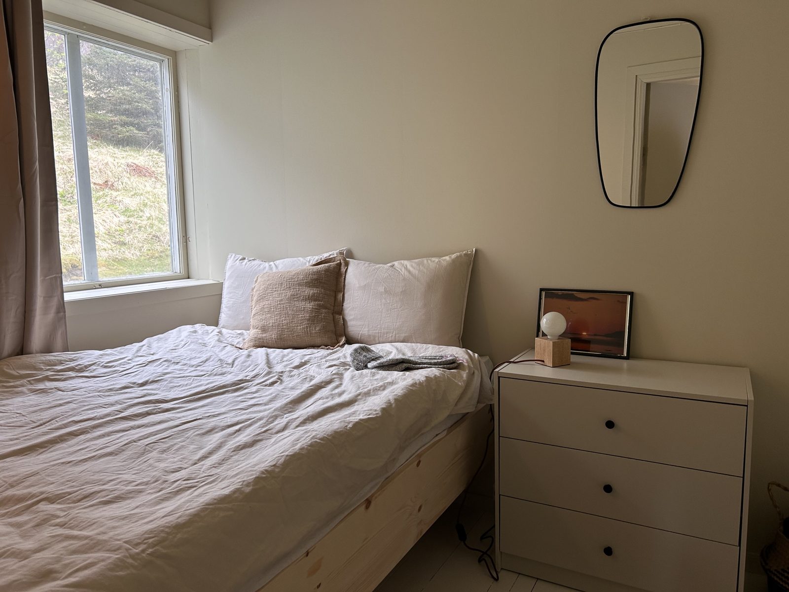 Bedroom with a queen bed. Photo 5 of 6.