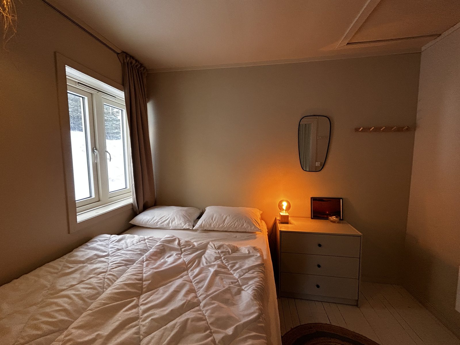Bedroom with a queen bed. Photo 6 of 6.
