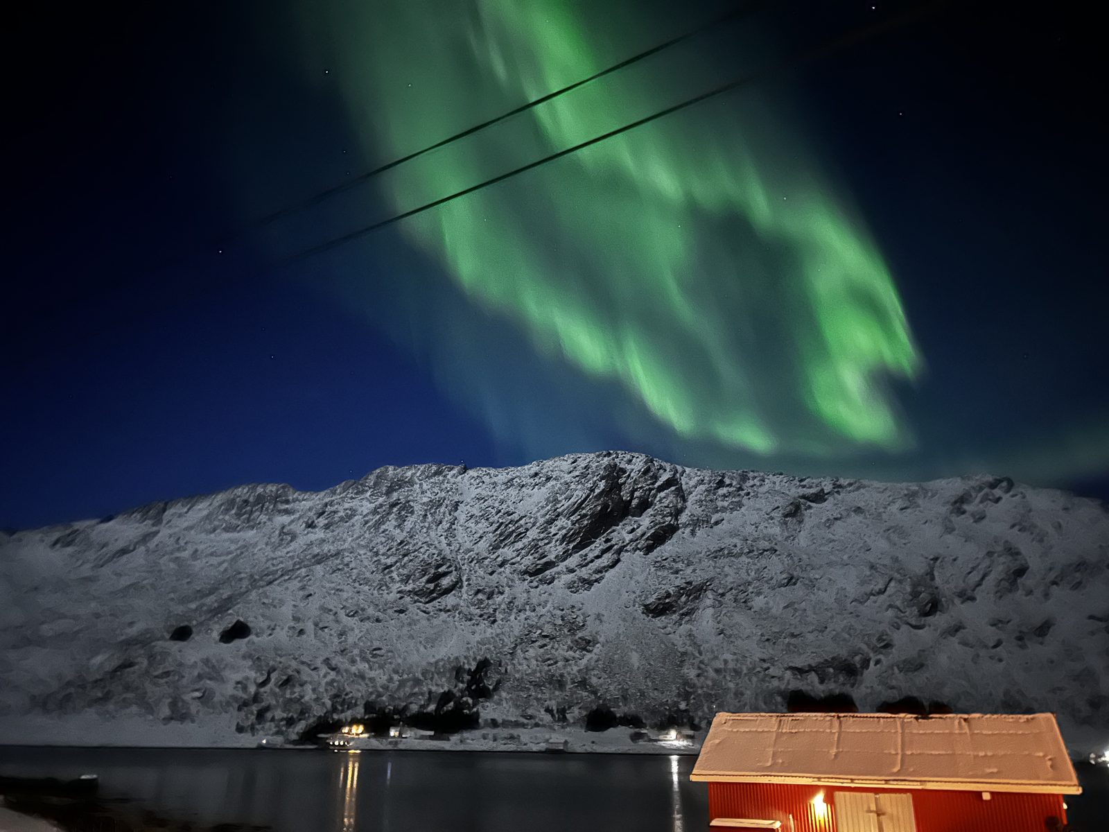 The boathouse sauna under the northern lights.