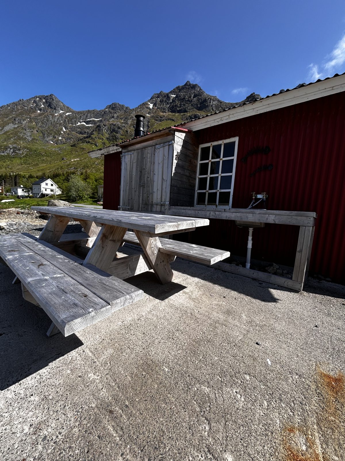 The seaward side of the boathouse with the gutting bench and the outdoor dining area (IMG_2920).