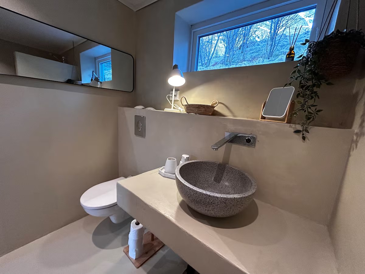 Bathroom on the lower floor. Photo 7 of 8.