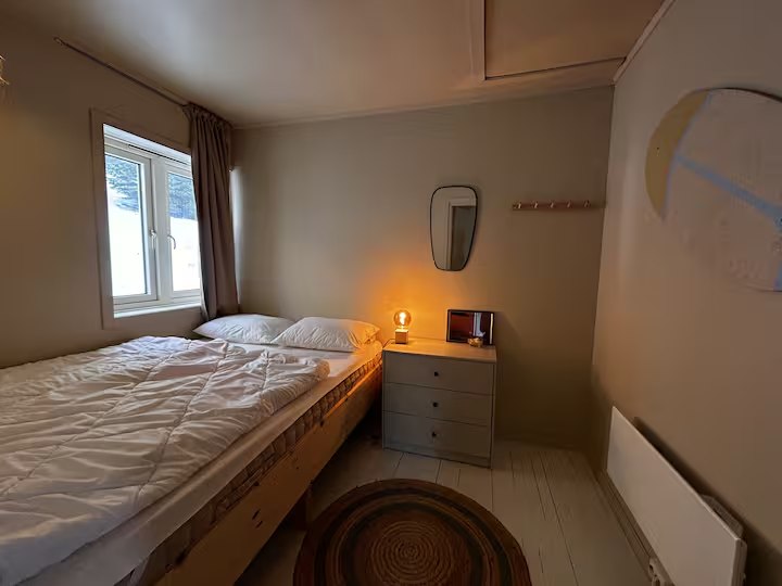 Bedroom with a queen bed. Photo 2 of 6.
