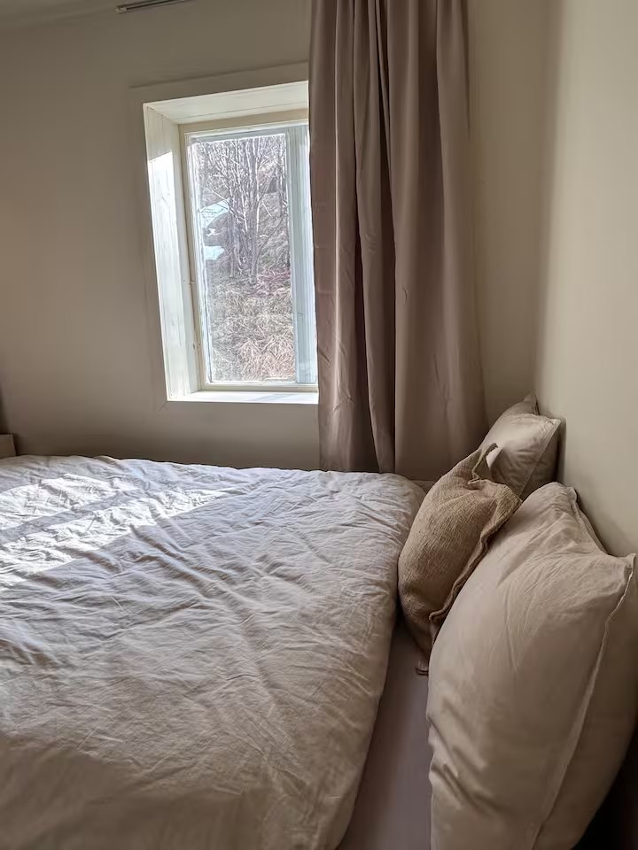 Bedroom with a queen bed. Photo 3 of 6.