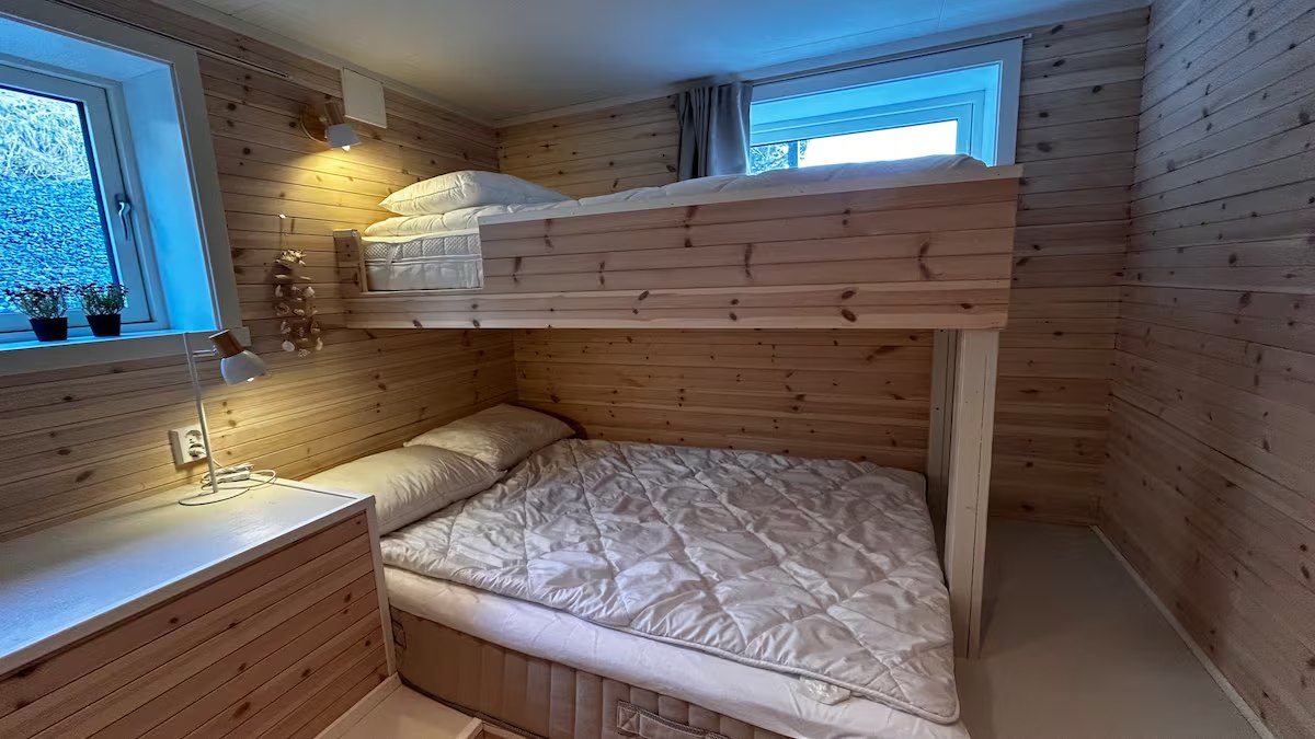 Bedroom with a bunk bed. Photo 2 of 7.