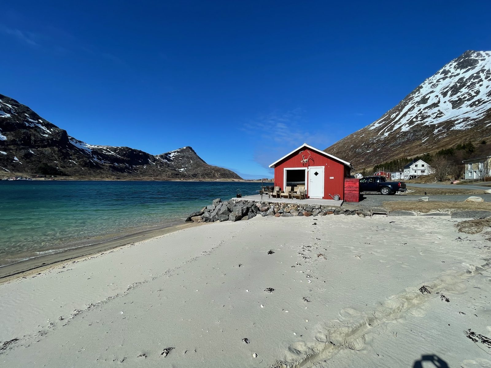The private beach in front of the sauna in summer.