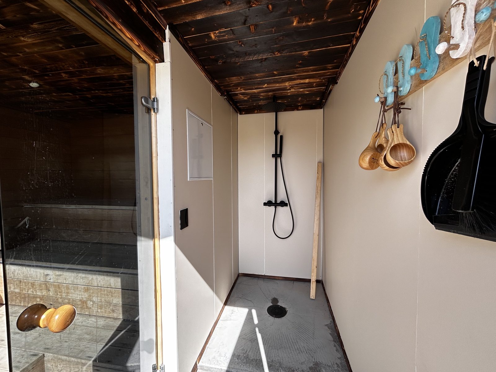 The shower room inside the sauna house.